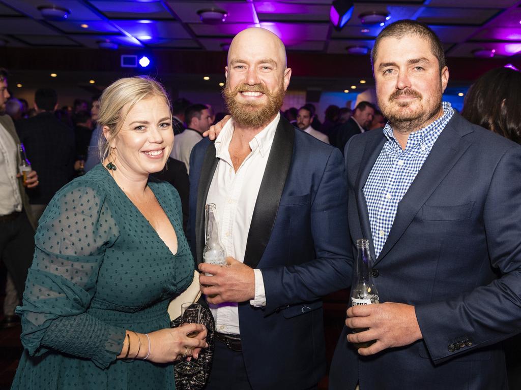 Tash Wheaton of Valdal Projects with Hughbert O'Reilly and James O'Reilly (right) of Toowoomba Formwork Company at the Downs and Western Housing and Construction Awards at Rumours International, Friday, July 22, 2022. Picture: Kevin Farmer