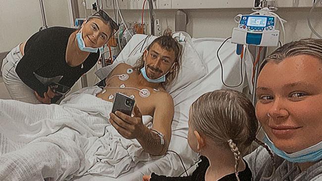 Brodie Turner started chemotherapy on his 24th birthday on August 2. Brodie’s partner Breanna Lucas is holding their daughter Oakah and Breanna’s sister Chloe Thomas is standing by the hospital bed.