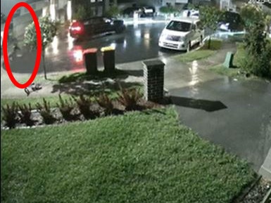 In this CCTV one of two gunmen, circled, can be seen running back towards a black SUV after a barrage of shots were unleased on the Marsden Park home. Picture: Supplied