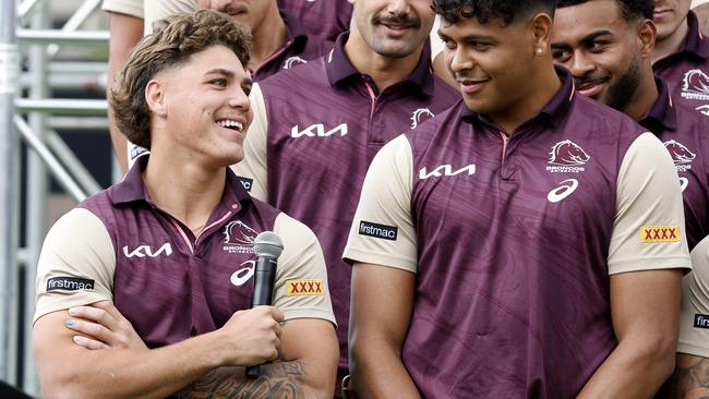 Reece Walsh (left) in a happier moment earlier during the NRL Fan day at Circular Quay. Photo: Adam Head