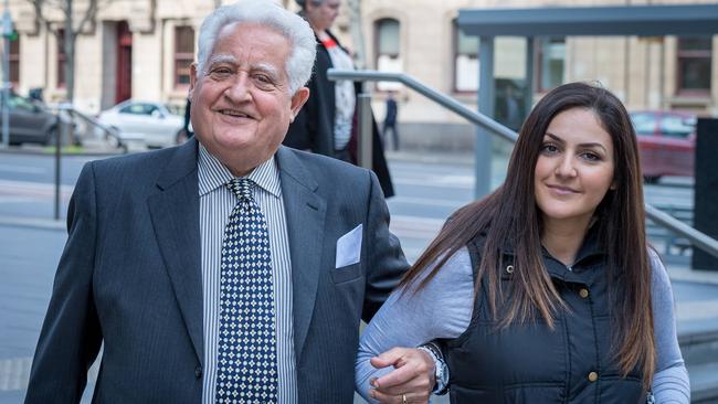 Franco Cozzo and his daughter leave court. Picture: Jake Nowakowski