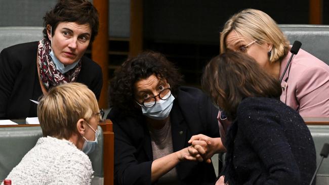 Teal independent MPs, from left, Kate Chaney, Zoe Daniels, Monique Ryan, Allegra Spender and Zali Steggall speak during debate in the House of Representatives at Parliament House in Canberra. Picture: AAP Image/Lukas Coch