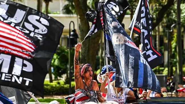 Supporters of former US President Donald Trump cheer for his arrival outside the Conservative Political Action Conference 2021 (CPAC) conference. Picture: AFPm