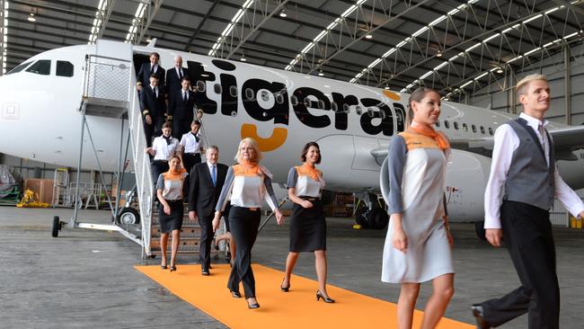 Walking the orange catwalk in their fancy new outfits. Photo: James Morgan.