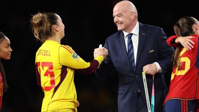 Cata Coll of Spain is congratulated by Gianni Infantino, President of FIFA. Photo by Cameron Spencer/Getty Images.