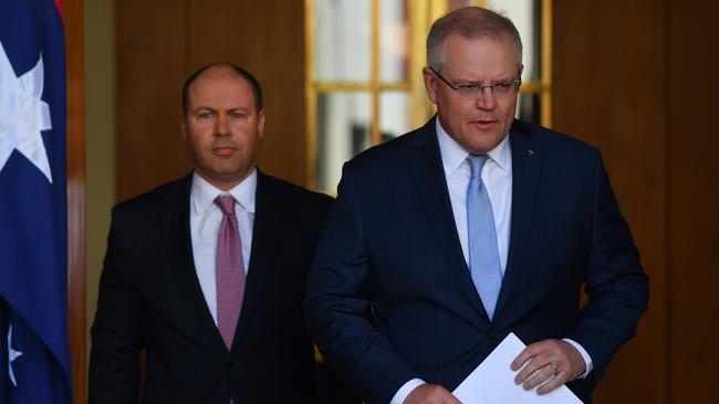 Treasurer Josh Frydenberg (left) and Prime Minister Scott Morrison arrive for a press conference at Parliament House on Thursday to speak about Australia's unemployment rate. Picture: Sam Mooy/Getty