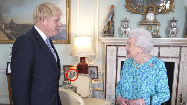 The Prime Minister met with the Queen in July — but look what’s in the background. Picture: Victoria Jones - WPA Pool/Getty Images