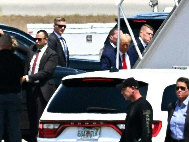 Former US President Donald Trump boards his plane in Florida en route to New York. Picture: AFP