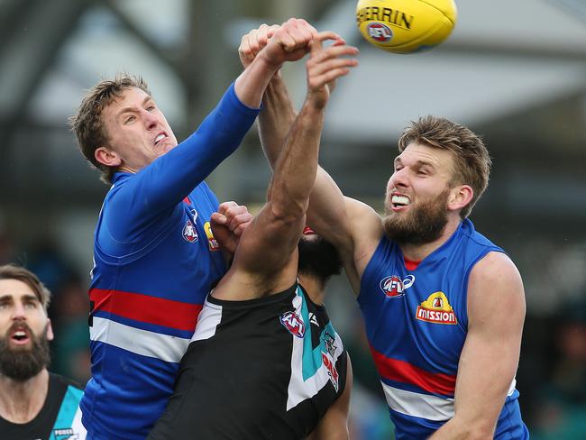 AFL Round 19. 29/07/2018. Western Bulldogs vs Port Adelaide at Mars Stadium, Ballarat.. Western Bulldogs Jackson Trengove and Aaron Naughton spoil Paddy ryder mark attempt   .Pic: Michael Klein