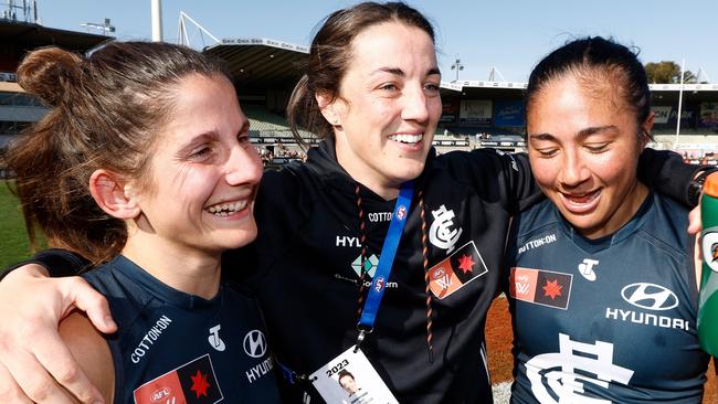 MELBOURNE, AUSTRALIA - SEPTEMBER 02: (L-R) Jessica Dal Pos, Kerryn Peterson and Darcy Vescio of the Blues celebrate during the 2023 AFLW Round 01 match between the Carlton Blues and the Gold Coast SUNS at IKON Park on September 02, 2023 in Melbourne, Australia. (Photo by Michael Willson/AFL Photos via Getty Images)