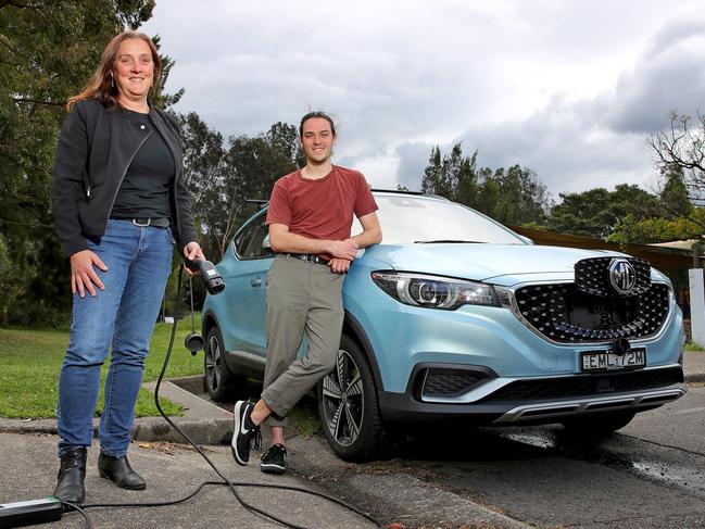 Renate Egan owns a new electric MG car, one of the more affordable electric cars on the market. Pictured with son Oliver Ashby outside their Annandale home. Picture: Toby Zerna