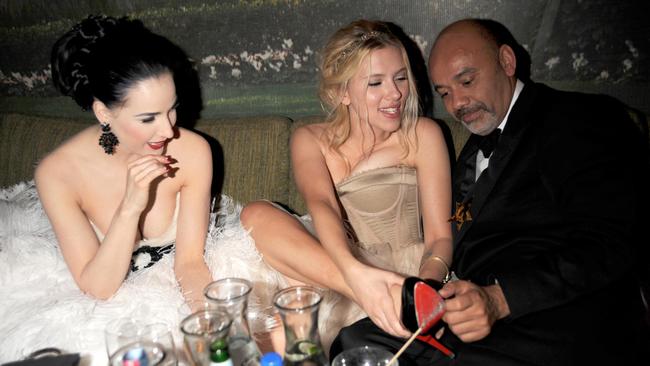 Dita Von Teese, Scarlett Johansson and Christian Louboutin, 2008. Picture: Shutterstock