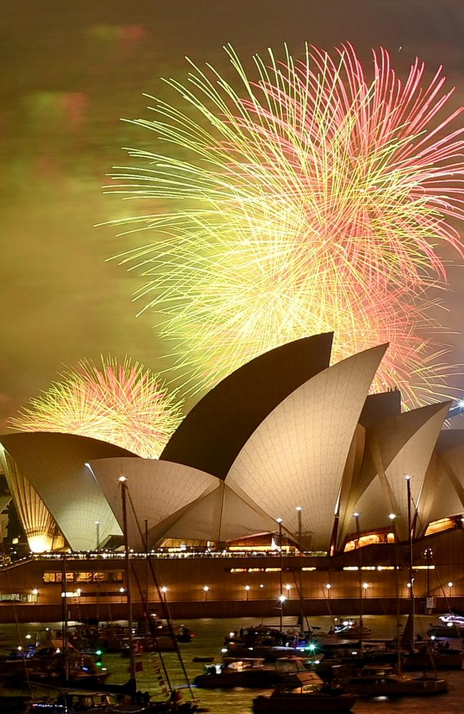 The "family fireworks", displayed three hours before midnight every year ahead of the main show at midnight, fill the sky over the Opera House in Sydney on New Year's Eve. Picture: Izhar Khan/Getty Images