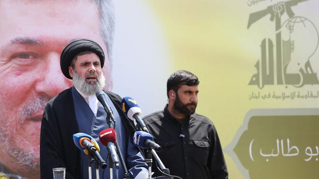 Senior Hezbollah official Hashem Safieddine, addresses mourners during the funeral of Taleb Abdallah, a senior field commander of Hezbollah who was killed in an Israeli strike. Picture: AFP.