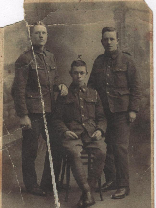“My father who landed on Gallipoli on April 25, 1915 at 7.30am. He was wounded in the head and sent to England to recuperate and eventually came back to Sydney (Pyrmont). Later marrying my mother Lillian and fathering seven children. Always had a job and suffered seizures all the rest of his life. Eventually dying in 1962, aged 66. He was finally granted a TPI pension about three years before he died. Harry (centre) landed on the shores of Anzac Cove at 7.30am on April 25, 1915 in a Company 3rd Battalion 1st AIF and his number was 1200. He was wounded on May 2, 1915 and repatriated to Australia from England in November 1915. Picture taken in a military hospital in Manchester, England in 1915.” Picture: Supplied by Robert Robertson (last surviving child)