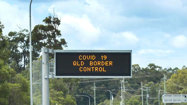 Coronavirus – COVID-19. An electronic sign on the M1 south bound displaying the upcoming Queensland / New South Wales border closure. Picture: NIGEL HALLETT