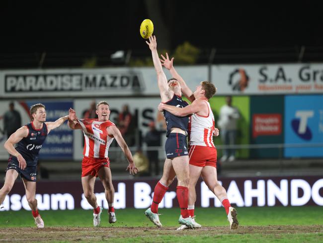 Redlegs ruckman Harry Boyd wins a hitout opposed to North Adelaide’s Mitch Harvey at Norwood Oval in Round 18. Picture: Cory Sutton.