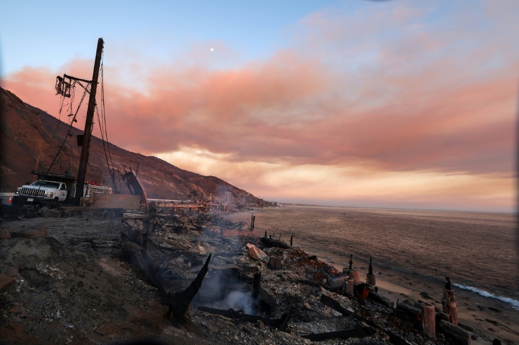 Death toll from Los Angeles fires rises, with dangerous winds incoming