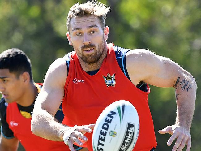 Bryce Cartwright looks on during the Gold Coast Titans training session on the Gold Coast, Tuesday, August 14, 2018. (AAP Image/Dave Hunt) NO ARCHIVING