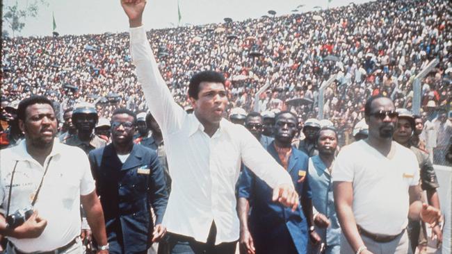 Muhammad Ali greets his fans ahead of ‘the Rumble in the Jungle’.