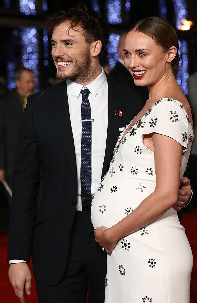 Actor Sam Claflin and Laura Haddock attend “The Hunger Games: Mockingjay Part 2” UK Premiere at the Odeon Leicester Square on November 5, 2015 in London. Picture: AFP