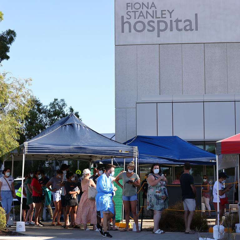 People queue for coronavirus testing at Fiona Stanley Hospital on Sunday. Picture: Paul Kane/Getty Images