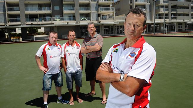 Greg Rolls upfront of fellow bowlers Mark McAleer, Ben Walsh and Warren Birks from Indooroopilly Bowls Club which has gone into liquidation but the members are determined to make a come back. Photo By Patria Jannides