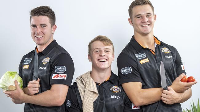 West Tigers development players Jock Madden, Reece Hoffman and Jake Simpkin share a house and a NRL dream. Pic: AAP/Matthew Vasilescu.