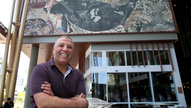 Crystalbrook Collection owner Ghassan Aboud in front of the dugong mural at the Bailey Hotel in Cairns PICTURE: ANNA ROGERS