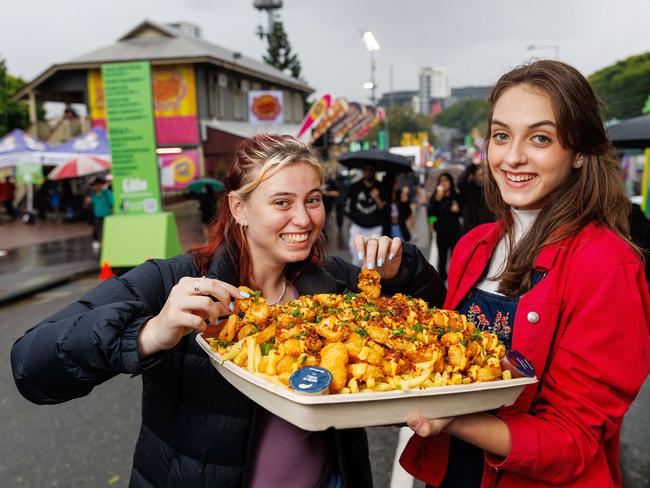 Chloe Edgar and Taylah Murphy with the epic nugs n chips. Picture: Josh Woning