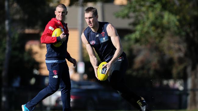 Melbourne’s Tom McDonald trains under the watchful eye of coach Simon Goodwin.