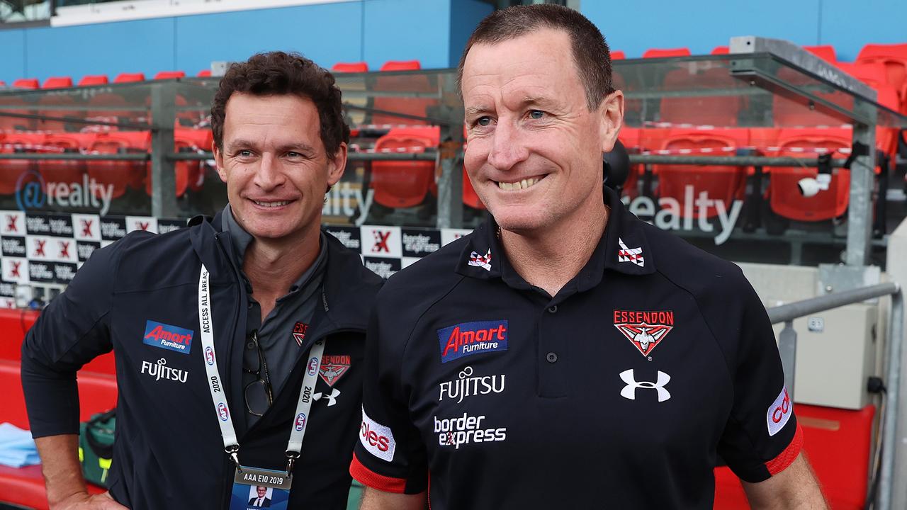 Xavier Campbell with former Bombers coach John Worsfold.