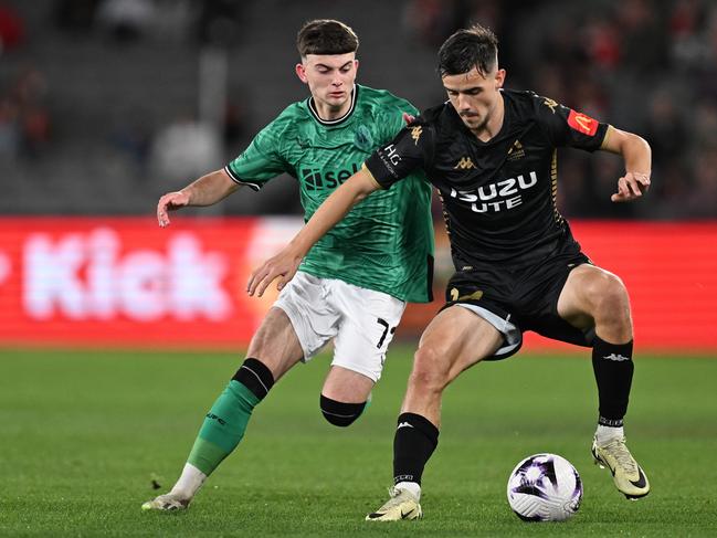 Nicolas Milanovic of the A-League All Stars holds possession under pressure from Newcastle’s Dylan Charlton. Picture: Getty Images