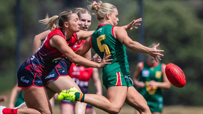 Tasmania Devils captain Sarah Skinner in full flight against Norwood at the Twin Ovals. She may have to wait until 2028 to play for Tasmania in the AFLW. Picture Solstice Digital