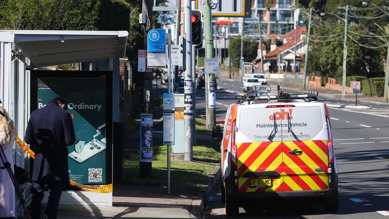 A view of the taped off area within the bus stop where a car hit the 25-year-old woman. Picture: NCA Newswire / Gaye Gerard