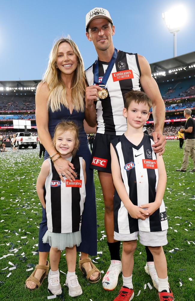 Scott Pendlebury with his wife Alex and children Jax and Darcy after the 2023 grand final. Picture: Dylan Burns/AFL Photos via Getty Images.