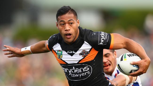 (FILE) MARCH 9, 2017 – The NRL has terminated the registration of Wests Tigers player Tim Simona over various betting scandals. SYDNEY, AUSTRALIA – MAY 21: Tim Simona of the Tigers is tackled during the round 11 NRL match between the Wests Tigers and the Newcastle Knights at Campbelltown Sports Stadium on May 21, 2016 in Sydney, Australia. (Photo by Cameron Spencer/Getty Images)