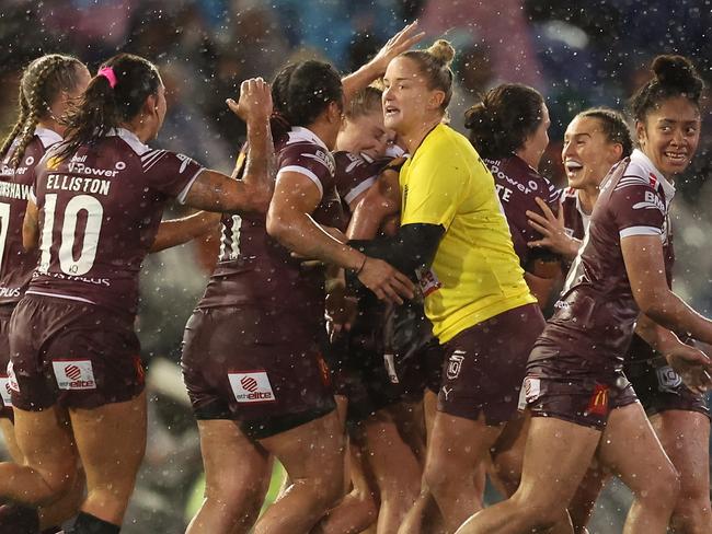 NEWCASTLE, AUSTRALIA - JUNE 06: Maroons players celebrate the teams during game two of the Women's State of Origin series between New South Wales Sky Blues and Queensland Maroons at McDonald Jones Stadium on June 06, 2024 in Newcastle, Australia. (Photo by Scott Gardiner/Getty Images)