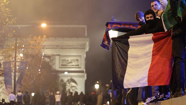 Football fans, next to the Arc de Triomphe