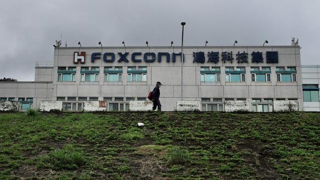 Taiwanese electronics giant and iPhone manufacturer Foxconn warned its last quarter earnings this year would take a hit from the coronavirus lockdowns affecting its assembly lines in the Chinese city of Zhengzhou. Picture: Sam Yeh / AFP