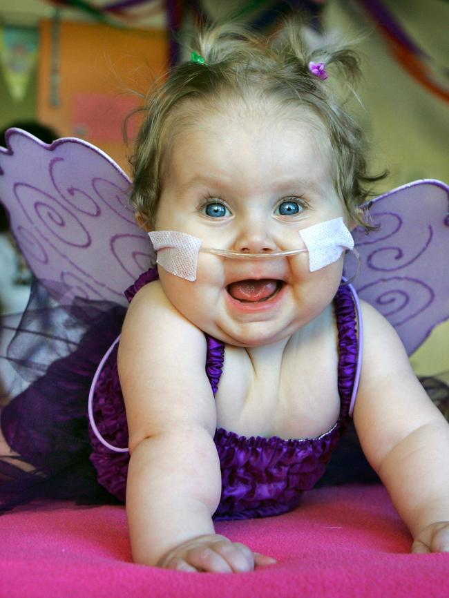 A little trooper, Pandora Humphries celebrated her first birthday at the Royal Children’s Hospital where she was battling a rare metabolic disease. Picture: Craig Borrow