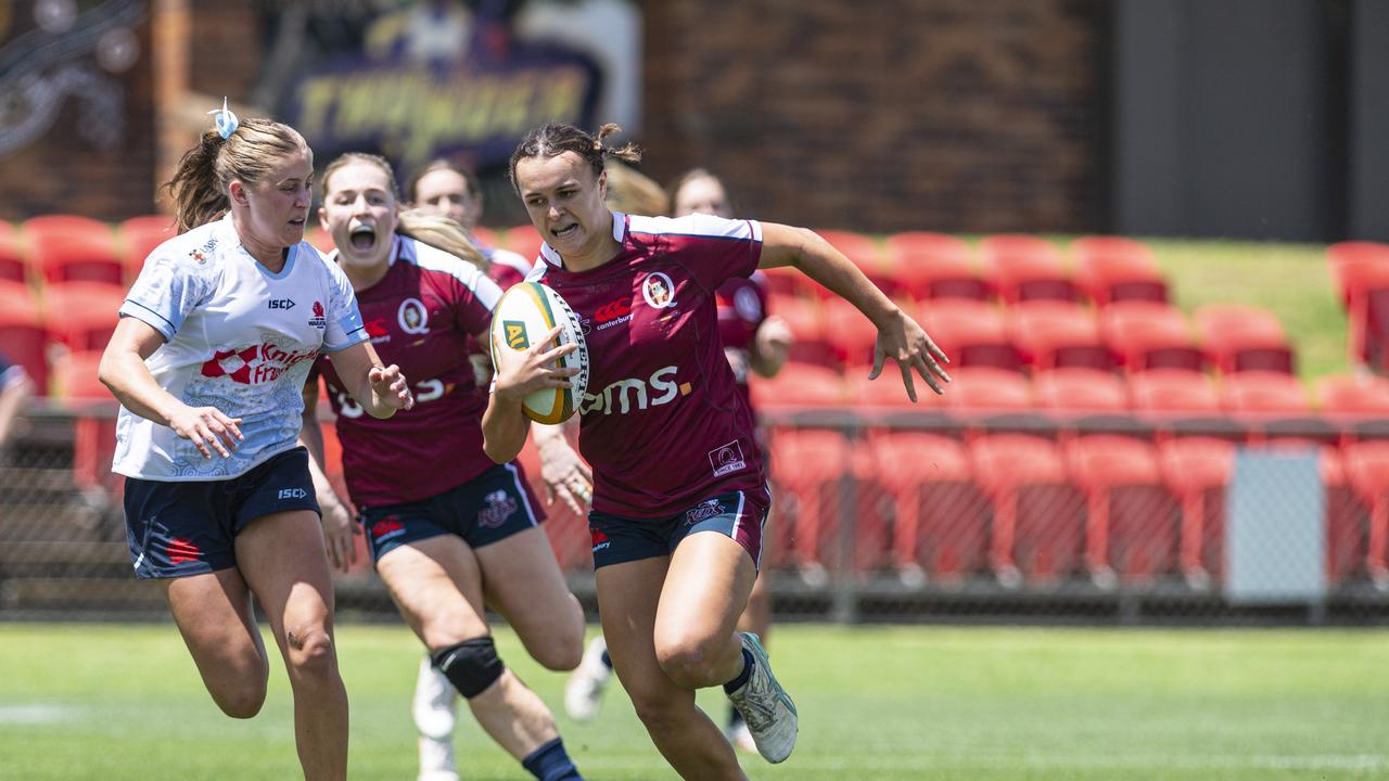 Ava Wereta (right) for Queensland Reds as Downs Rugby at host Next Gen 7s at Toowoomba Sports Ground, Saturday, October 12, 2024. Picture: Kevin Farmer