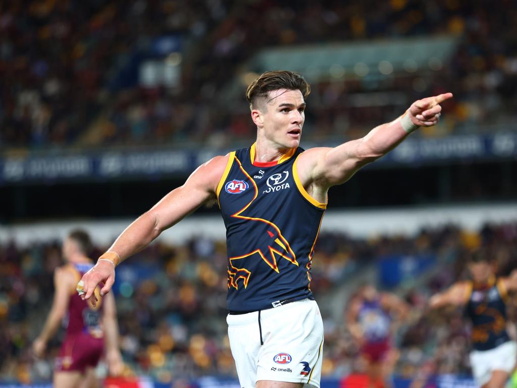 Ben Keays of the Crows celebrates a goal at his old stomping ground of the Gabba. Picture: Chris Hyde/AFL Photos/via Getty Images.