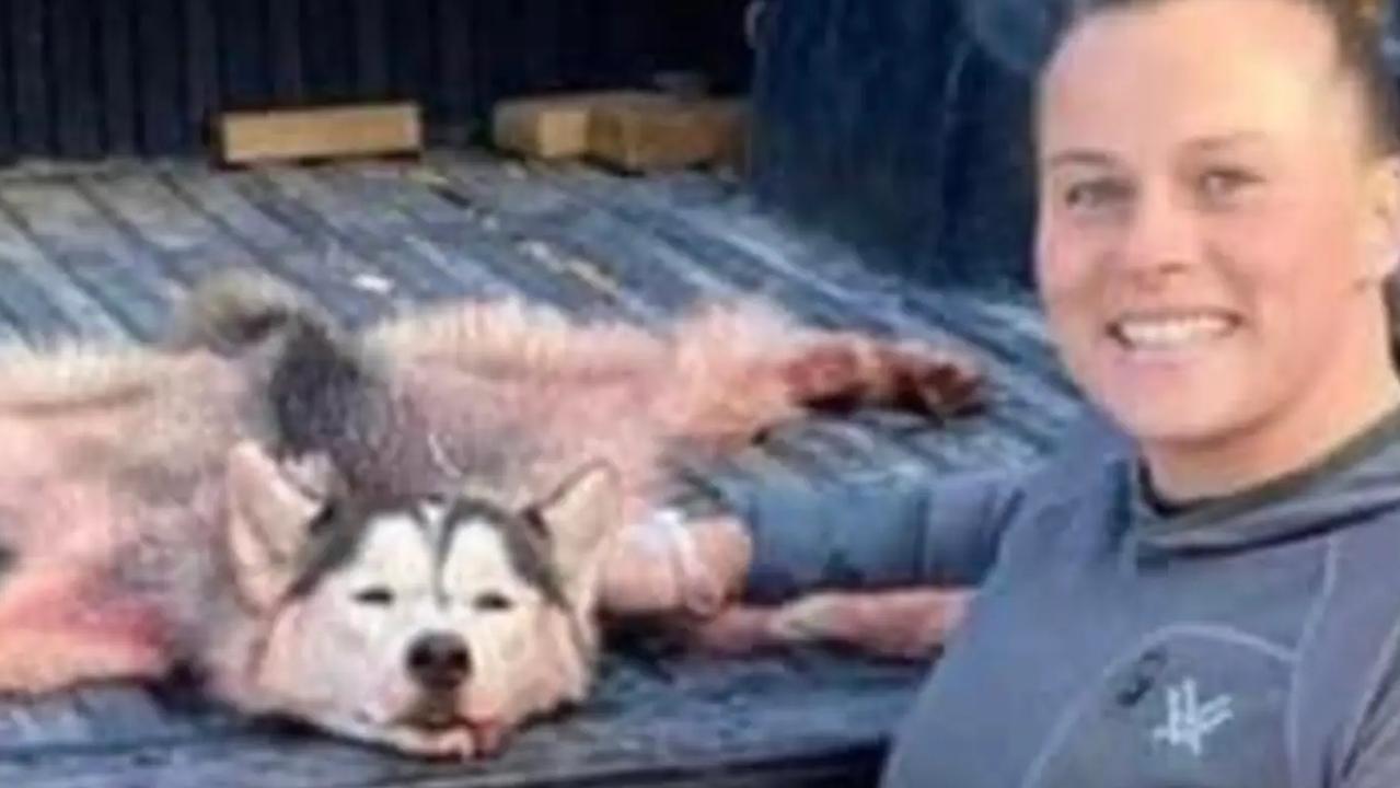 Amber Rose proudly poses with the Husky she killed and skinned.