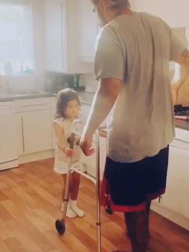 Mose Masoe with his daughter.