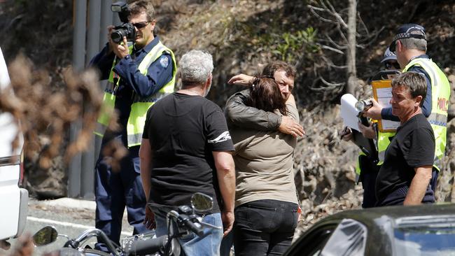 The scene of a fatal car vs motorbike crash on Nerang Murwillumbah Rd. Friends from the riding group coming together. Picture: Jerad Williams