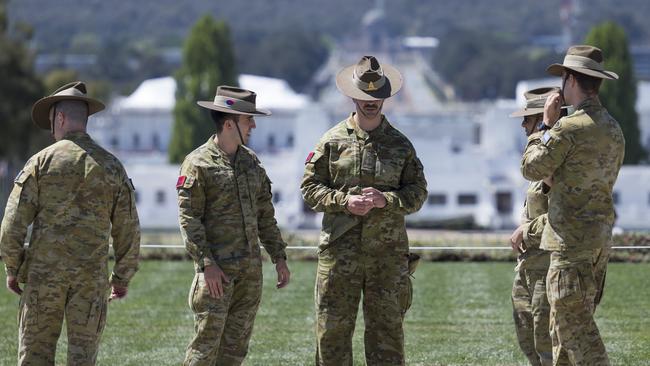 Members to the Royal Regiment of Australian Artillery prepare at Parliament House in Canberra ahead of the royal visit. Picture: NewsWire / Martin Ollman