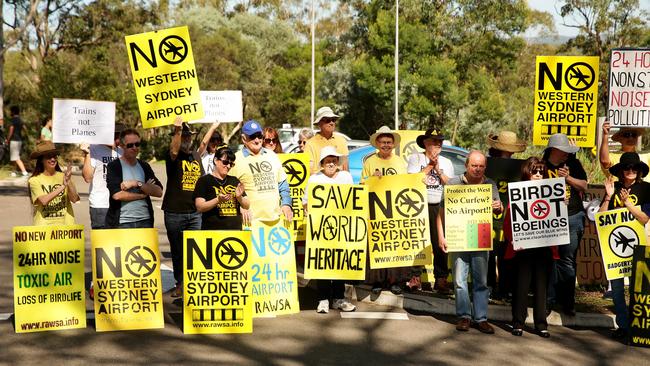 Members of the Residents Against Western Sydney Airport (RAWSA) action group converge on the gates to the Blue Mountains National Park to let tourists know their gripes