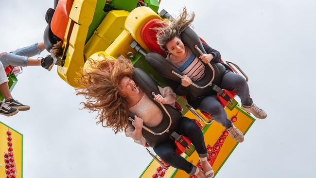 Emily bridgeman, 16 and Meredith Leviston, 17 at the Royal Melbourne Show. Picture: Jason Edwards