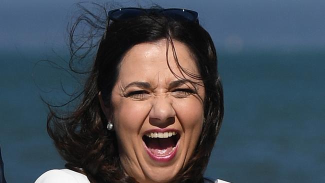 Queensland Premier Annastacia Palaszczuk laughs as she poses for a photo after meeting Labor volunteers in Brisbane, Friday, November 24, 2017. Ms Palaszczuk is on the campaign trail ahead of tomorrow's state election. (AAP Image/Dan Peled) NO ARCHIVING